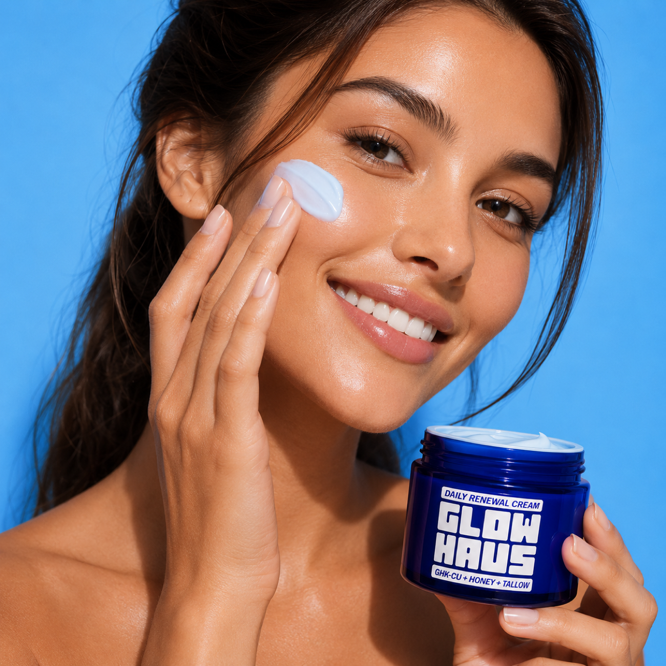 Glow Haus cream held in hand